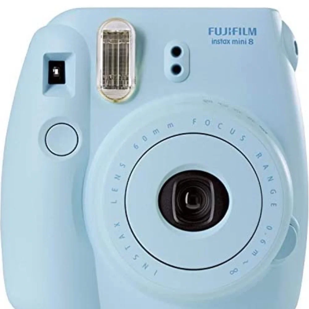 Fujifilm instax mini 8 lens 60mm, focus range 0.6m. Instant print